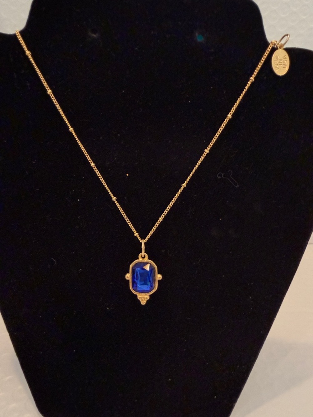Gold-Tone Necklace with Royal Blue Faceted Pendant by Susan Shaw. 16”w extender